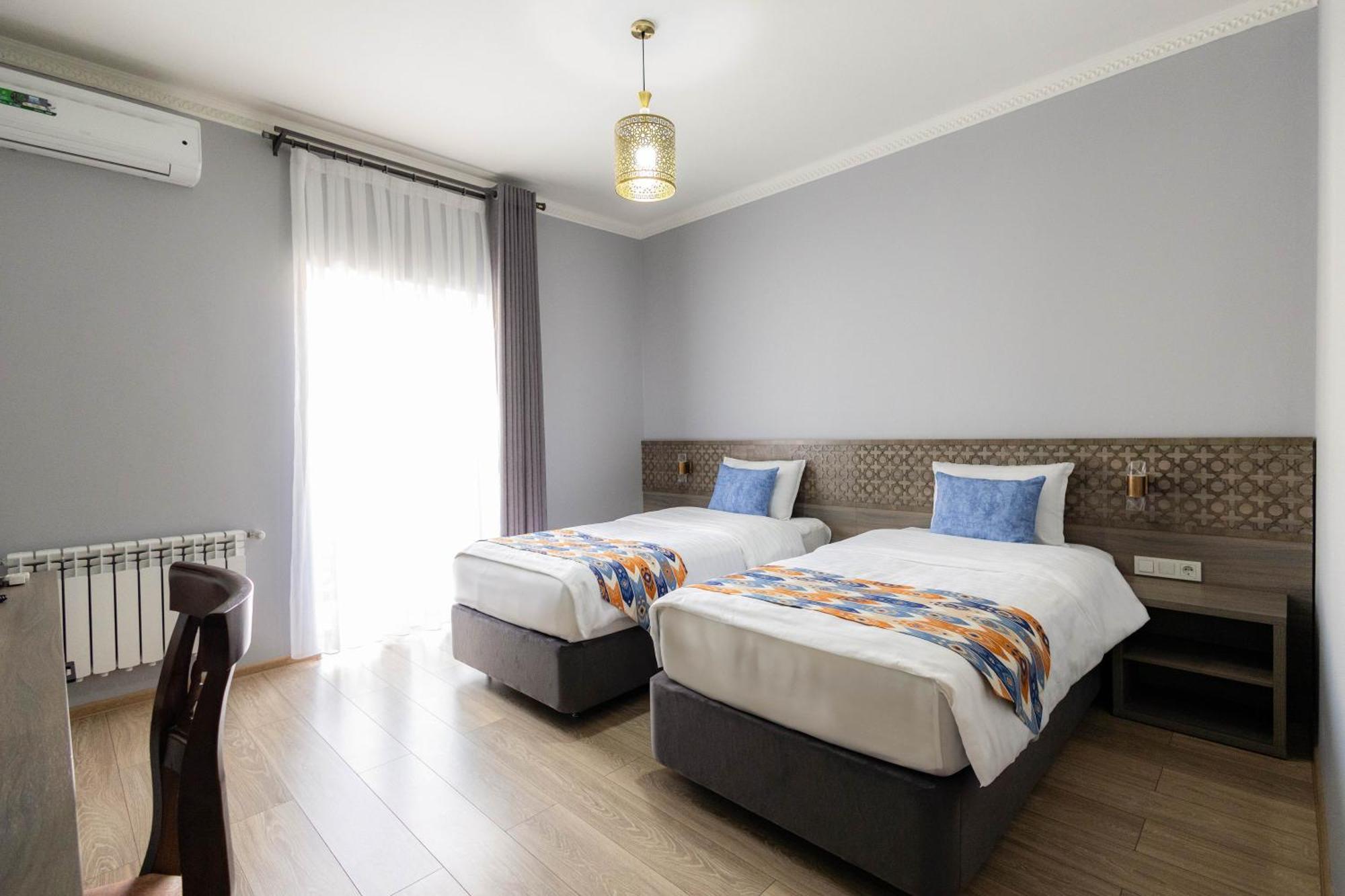 Khan Hotel Samarkand Quarto foto