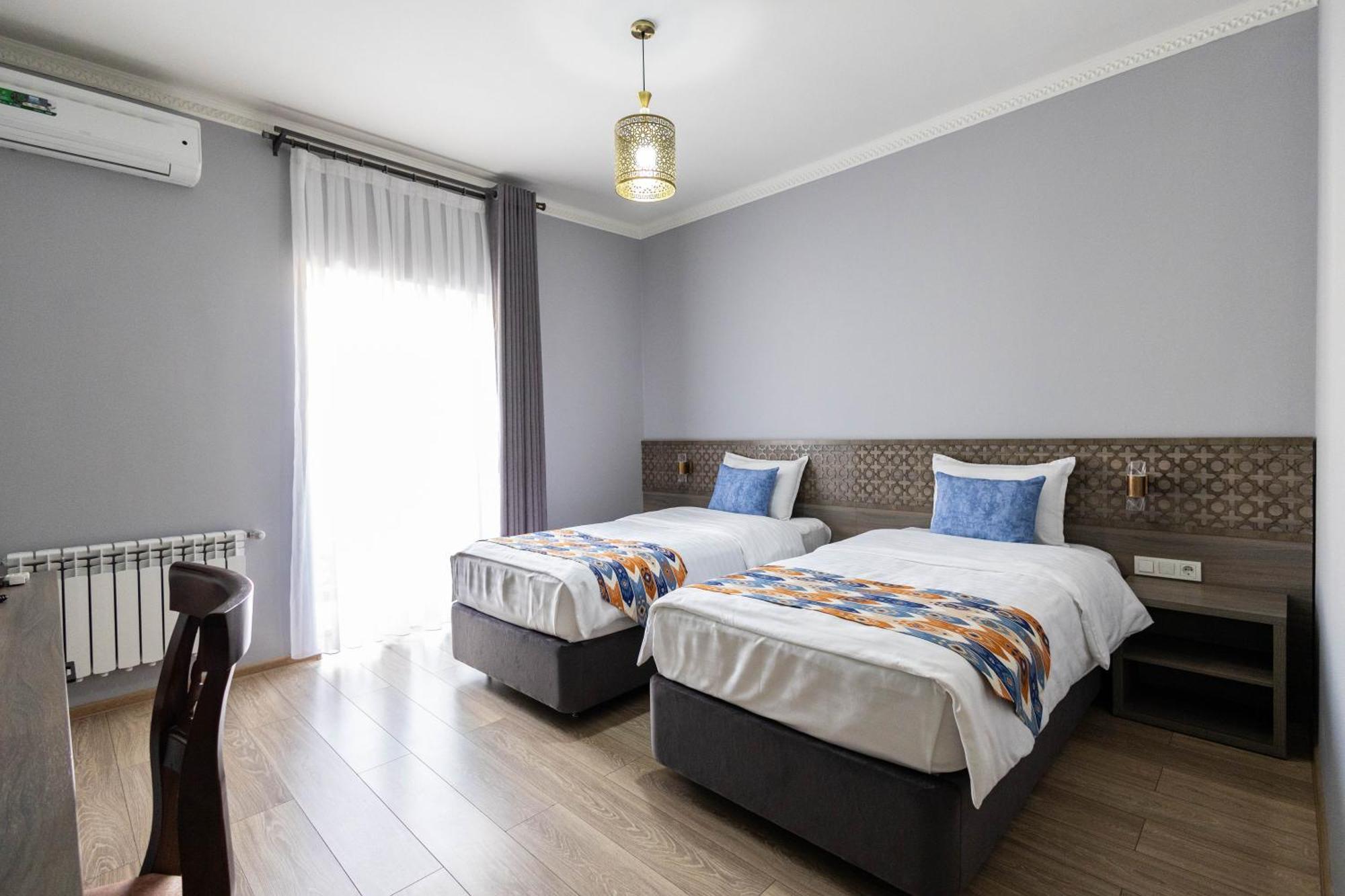 Khan Hotel Samarkand Quarto foto